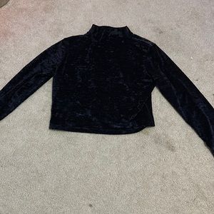 size 12 lululemon velvet cropped long sleeve in black.